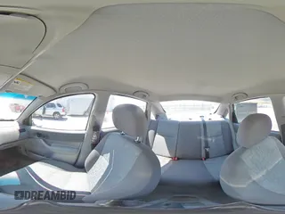 2005 Ford Focus S with VIN 1FAFP34N05W296550, listed as a Copart auction lot 59391835 with 216,509 mi miles and Salvage title. Bid and sale history available at DreamBid. Image 15.