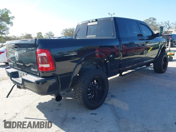 2019 Ram 2500 Laramie with VIN 3C6UR5NL9KG607477, listed as a IAAI auction lot 41712518 with 116,613 mi miles. Bid and sale history available at carsss.com. Image 4.