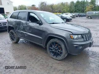 2021 Jeep Grand Cherokee Laredo X with VIN 1C4RJFAG1MC810633, listed as a IAAI auction lot 42187333 with 55,744 mi miles and . Bid and sale history available at DreamBid. Image 1.