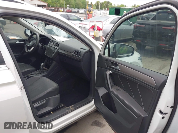 2023 Volkswagen Tiguan SE with VIN 3VVMB7AX0PM036876, listed as a IAAI auction lot 42023415 with 42,003 mi miles and . Bid and sale history available at DreamBid. Image 5.
