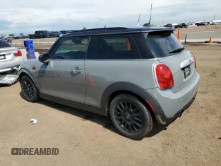 2015 MINI Hardtop with VIN WMWXM5C5XFT974077, listed as a Copart auction lot 58063965 with 93,853 mi miles and Salvage title. Bid and sale history available at DreamBid. Image 2.