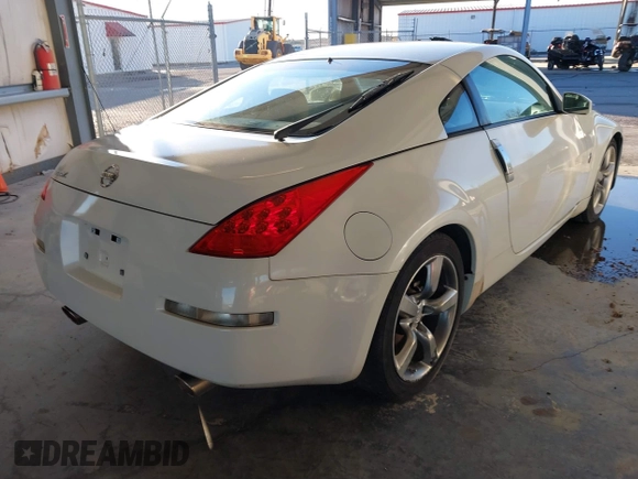 2006 Nissan 350Z Touring z VIN JN1AZ34D86M307042, wystawiony jako IAAI lot #41016528 z przebiegiem 124 303 mil mil oraz . Historia ofert i sprzedaży dostępna na DreamBid. Obrazek 4.