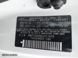 2014 Hyundai Veloster with VIN KMHTC6AD6EU211479, listed as a IAAI auction lot 41196275 with 132,337 mi miles. Bid and sale history available at carsss.com. Image 9.