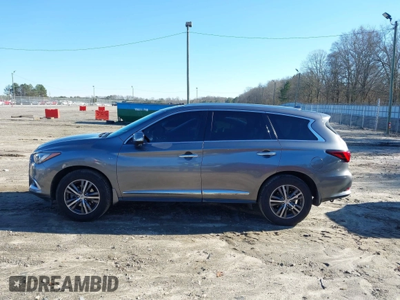 2016 Infiniti QX60 with VIN 5N1AL0MM0GC524715, listed as a IAAI auction lot 41215072 with 145,633 mi miles and . Bid and sale history available at DreamBid. Image 14.