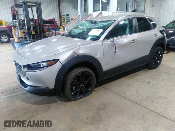 2024 Mazda CX-30 2.5 S Select Sport with VIN 3MVDMBBM0RM658069, listed as a IAAI auction lot 42130803 with 26,714 mi miles. Bid and sale history available at carsss.com. Image 6.