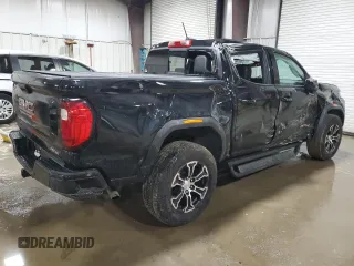 2023 GMC Canyon 4WD AT4 with VIN 1GTP6DEK9P1212477, listed as a Copart auction lot 44889115 with 20,063 mi miles and Salvage Title. Bid and sale history available at carsss.com. Image 3.