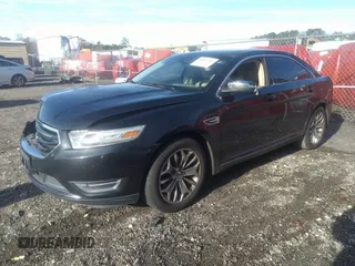 2014 Ford Taurus Limited with VIN 1FAHP2F80EG101504, listed as a IAAI auction lot 40974783 with 177,522 mi miles. Bid and sale history available at carsss.com. Image 2.