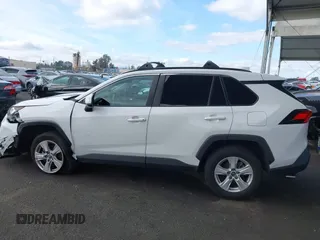 2019 Toyota RAV4 XLE with VIN 2T3W1RFV5KW051023, listed as a IAAI auction lot 40970612 with 106,359 mi miles and . Bid and sale history available at DreamBid. Image 13.