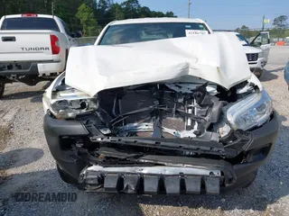2023 Toyota Tacoma SR with VIN 3TYRX5GN2PT074548, listed as a IAAI auction lot 42186707 with Not provided miles and . Bid and sale history available at DreamBid. Image 6.