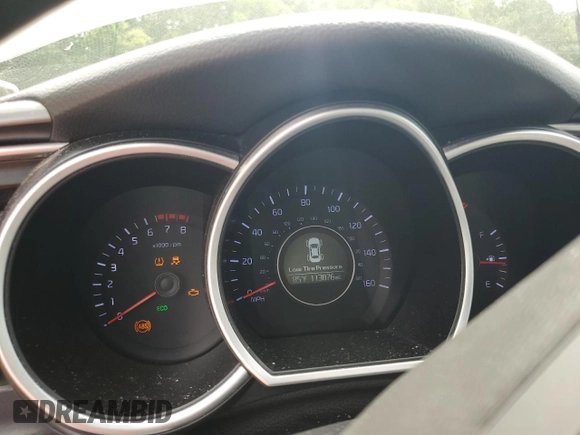 2015 Kia Optima LX with VIN KNAGM4A70F5660912, listed as a Copart auction lot 60232795 with 113,876 mi miles and Salvage title. Bid and sale history available at DreamBid. Image 9.