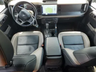 2022 Ford Bronco z VIN 1FMEE5DP6NLB28658, wystawiony jako Copart lot #60632405 z przebiegiem 28 221 mil mil oraz Szkoda całkowita • Salvage title. Historia ofert i sprzedaży dostępna na DreamBid. Obrazek 8.