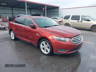 2014 Ford Taurus SEL z VIN 1FAHP2E80EG179072, wystawiony jako IAAI lot #42418089 z przebiegiem 198 963 mil mil oraz . Historia ofert i sprzedaży dostępna na DreamBid. Obrazek 1.