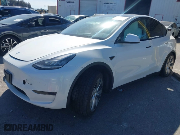 2020 Tesla Model Y Long Range with VIN 5YJYGDEE2LF044811, listed as a IAAI auction lot 41839136 with 68,445 mi miles and . Bid and sale history available at DreamBid. Image 17.
