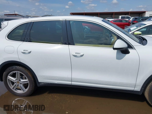 2014 Porsche Cayenne with VIN WP1AA2A21ELA94214, listed as a IAAI auction lot 42389334 with 114,276 mi miles and . Bid and sale history available at DreamBid. Image 13.