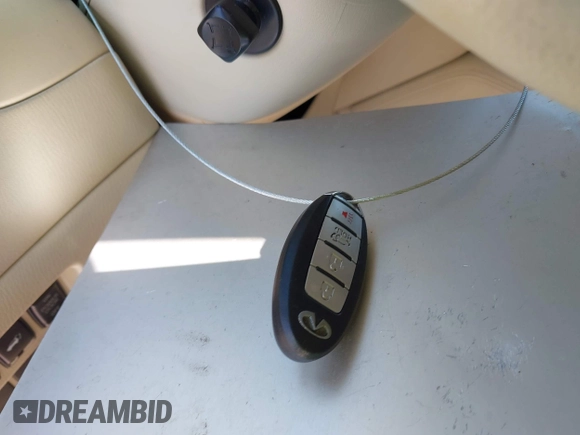 2013 Infiniti JX35 with VIN 5N1AL0MM6DC332579, listed as a IAAI auction lot 42138584 with 137,046 mi miles and . Bid and sale history available at DreamBid. Image 11.