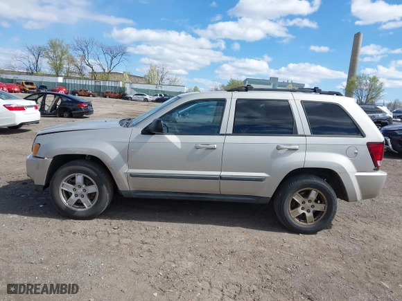 2007 Jeep Grand Cherokee Laredo with VIN 1J8GR48KX7C513145, listed as a IAAI auction lot 41994486 with 188,870 mi miles. Bid and sale history available at carsss.com. Image 14.