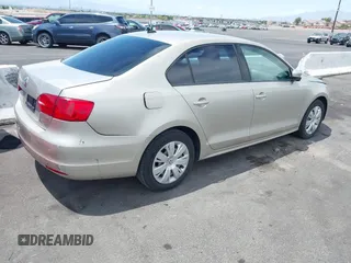 2014 Volkswagen Jetta SE with VIN 3VWD17AJ9EM271431, listed as a IAAI auction lot 42419304 with 143,599 mi miles and . Bid and sale history available at DreamBid. Image 4.