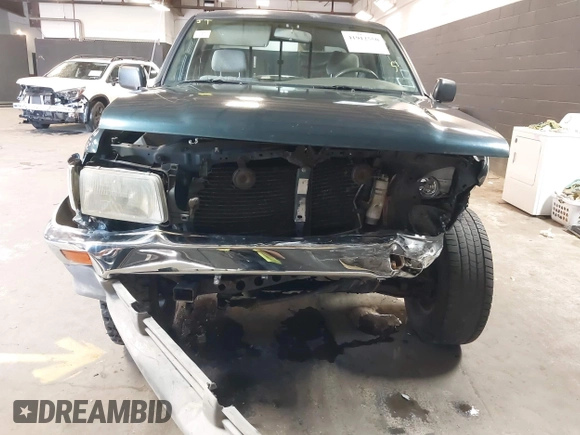 1996 Toyota T100 DX with VIN JT4UN22D2T0020138, listed as a IAAI auction lot 41912550 with 164,007 mi miles. Bid and sale history available at carsss.com. Image 12.