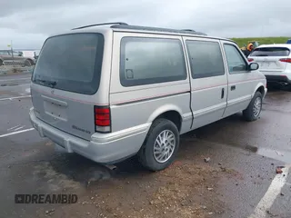 1993 Dodge Caravan Grand SE z VIN 1B4GH44R7PX729957, wystawiony jako IAAI lot #41932278 z przebiegiem 176 577 mil mil oraz . Historia ofert i sprzedaży dostępna na DreamBid. Obrazek 4.