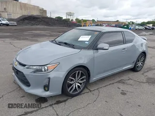 2014 Scion tC z VIN JTKJF5C71E3081033, wystawiony jako IAAI lot #42333111 z przebiegiem 144 124 mil mil oraz . Historia ofert i sprzedaży dostępna na DreamBid. Obrazek 17.