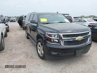 2015 Chevrolet Suburban LT with VIN 1GNSCJKC1FR304656, listed as a IAAI auction lot 42071124 with 133,140 mi miles. Bid and sale history available at carsss.com. Image 1.