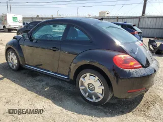 2012 Volkswagen Beetle 2.5L w/Sound/Nav PZEV with VIN 3VWJP7AT7CM646779, listed as a Copart auction lot 53756265 with 116,662 mi miles and Salvage Title. Bid and sale history available at DreamBid. Image 2.