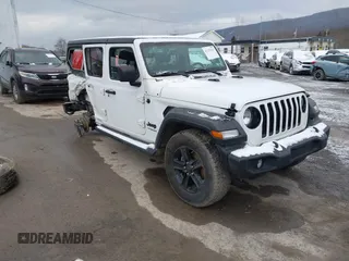 2021 Jeep Wrangler Unlimited Sport Altitude with VIN 1C4HJXDG2MW791599, listed as a IAAI auction lot 41235427 with 47,220 mi miles and . Bid and sale history available at DreamBid. Image 1.