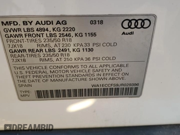 2018 Audi Q3 Premium with VIN WA1ECCFS9JR029396, listed as a Copart auction lot 87397324 with 96,049 mi miles and Salvage Title. Bid and sale history available at carsss.com. Image 12.
