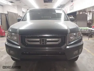 2011 Honda Ridgeline RTL with VIN 5FPYK1F57BB004189, listed as a IAAI auction lot 41871741 with 193,913 mi miles. Bid and sale history available at carsss.com. Image 12.