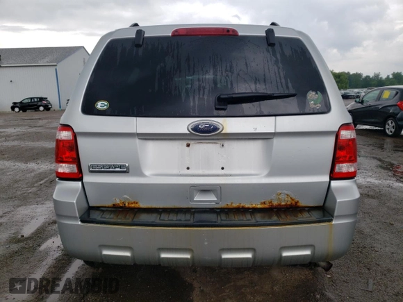 2010 Ford Escape XLS with VIN 1FMCU9C78AKD21851, listed as a Copart auction lot 61444945 with 70,404 mi miles and Clean title. Bid and sale history available at DreamBid. Image 6.