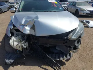 2016 Nissan Sentra S with VIN 3N1AB7AP2GY272202, listed as a IAAI auction lot 41735127 with 111,961 mi miles. Bid and sale history available at carsss.com. Image 6.