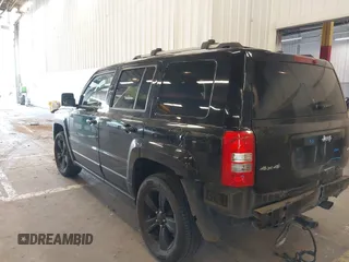 2014 Jeep Patriot Limited with VIN 1C4NJRCB4ED629085, listed as a IAAI auction lot 39414215 with 87,409 mi miles. Bid and sale history available at carsss.com. Image 3.