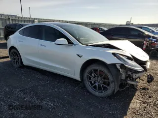2020 Tesla Model 3 Standard Range Plus z VIN 5YJ3E1EA9LF718478, wystawiony jako Copart lot #52707145 z przebiegiem 111 068 mil mil oraz Szkoda całkowita • Salvage title. Historia ofert i sprzedaży dostępna na DreamBid. Obrazek 4.