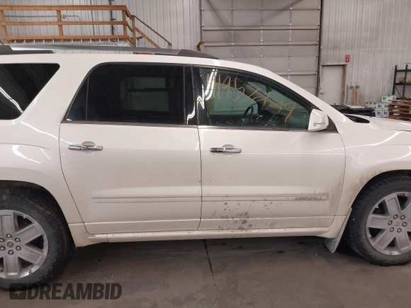2014 GMC Acadia Denali with VIN 1GKKVTKD4EJ238869, listed as a IAAI auction lot 41957229 with 182,189 mi miles and . Bid and sale history available at carsss.com. Image 14.