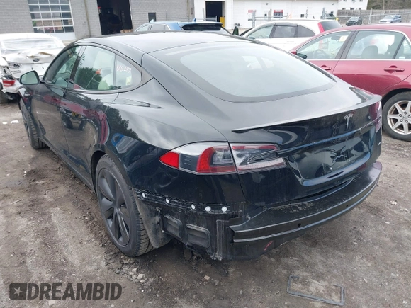 2021 Tesla Model S Plaid with VIN 5YJSA1E69MF439147, listed as a IAAI auction lot 41825656 with 25,626 mi miles. Bid and sale history available at carsss.com. Image 3.