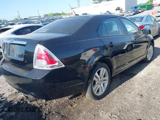 2008 Ford Fusion S with VIN 3FAHP06Z28R114569, listed as a IAAI auction lot 42035714 with 139,656 mi miles. Bid and sale history available at carsss.com. Image 4.