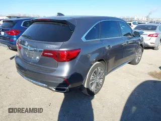 2020 Acura MDX w/Technology Pkg with VIN 5J8YD3H50LL003946, listed as a IAAI auction lot 41407372 with 24,076 mi miles. Bid and sale history available at carsss.com. Image 4.