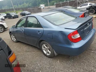 2002 Toyota Camry LE z VIN 4T1BE32K82U635971, wystawiony jako Copart lot #60784855 z przebiegiem Nie podano mil oraz Szkoda całkowita • Salvage title. Historia ofert i sprzedaży dostępna na DreamBid. Obrazek 2.