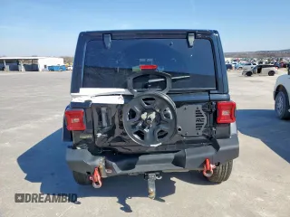 2021 Jeep Wrangler Unlimited Rubicon with VIN 1C4JJXFM9MW565029, listed as a Copart auction lot 44030695 with 76,510 mi miles and Salvage Title. Bid and sale history available at carsss.com. Image 6.