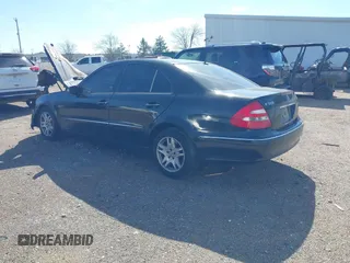 2005 Mercedes-Benz E-Class 3.2L with VIN WDBUF65J65A695704, listed as a IAAI auction lot 41618041 with 1 mi miles. Bid and sale history available at carsss.com. Image 3.
