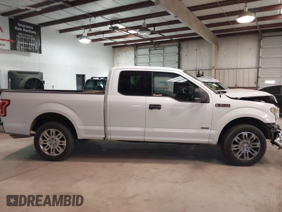 2015 Ford F-150 XL with VIN 1FTEX1CG5FKD31637, listed as a IAAI auction lot 41607827 with 201,278 mi miles. Bid and sale history available at carsss.com. Image 13.