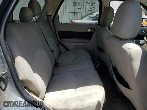 2010 Mercury Mariner with VIN 4M2CN8B7XAKJ03580, listed as a Copart auction lot 57269525 with 265,789 mi miles and Salvage title. Bid and sale history available at DreamBid. Image 11.