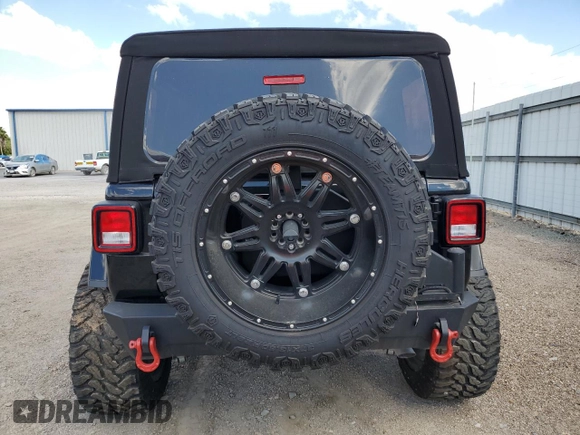 2023 Jeep Wrangler Rubicon with VIN 1C4HJXFG3PW682375, listed as a Copart auction lot 73969434 with Not provided miles and Salvage title. Bid and sale history available at DreamBid. Image 6.