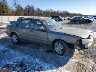 2001 Mazda 626 LX with VIN 1YVGF22D815242283, listed as a Copart auction lot 42141985 with 36,448 mi miles and Salvage Title. Bid and sale history available at carsss.com. Image 4.