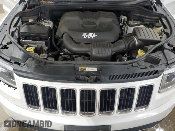 2014 Jeep Grand Cherokee Limited with VIN 1C4RJFBG1EC140601, listed as a Copart auction lot 56298305 with 131,193 mi miles and Salvage title. Bid and sale history available at DreamBid. Image 12.