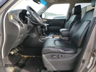 2012 Infiniti QX56 7-passenger with VIN JN8AZ2NE3C9017910, listed as a Copart auction lot 54199494 with 242,851 mi miles and Salvage Title. Bid and sale history available at carsss.com. Image 7.