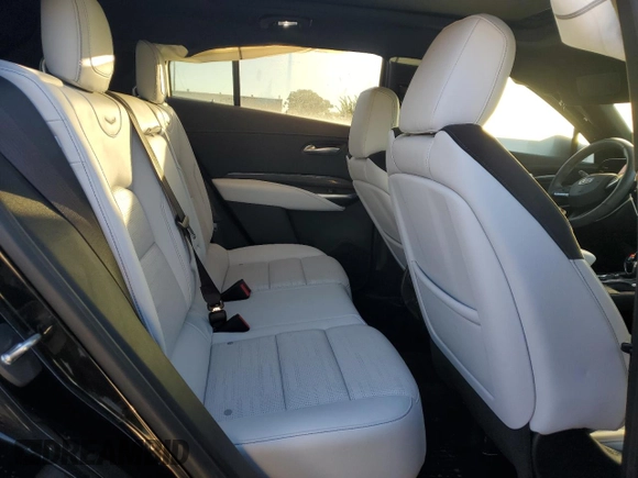 2024 Cadillac XT4 FWD Sport with VIN 1GYFZER47RF101186, listed as a Copart auction lot 79128454 with 10,499 mi miles and Salvage title. Bid and sale history available at DreamBid. Image 11.