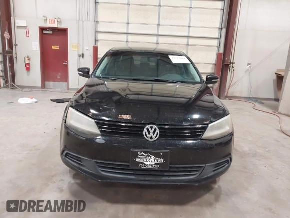 2014 Volkswagen Jetta SE with VIN 3VWD17AJ7EM409189, listed as a IAAI auction lot 42313804 with 139,950 mi miles and . Bid and sale history available at DreamBid. Image 12.