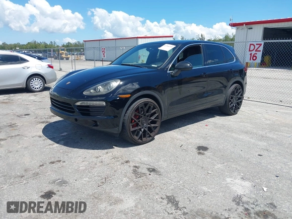 2012 Porsche Cayenne with VIN WP1AA2A21CLA02418, listed as a IAAI auction lot 42266318 with 85,345 mi miles and . Bid and sale history available at DreamBid. Image 2.