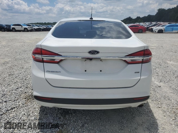 2017 Ford Fusion SE с VIN 3FA6P0H76HR279379, выставлен на аукционе Copart как лот 63052475 с пробегом 131 268 миль миль и Списание • Salvage title. История ставок и продаж доступна на DreamBid. Изображение 6.